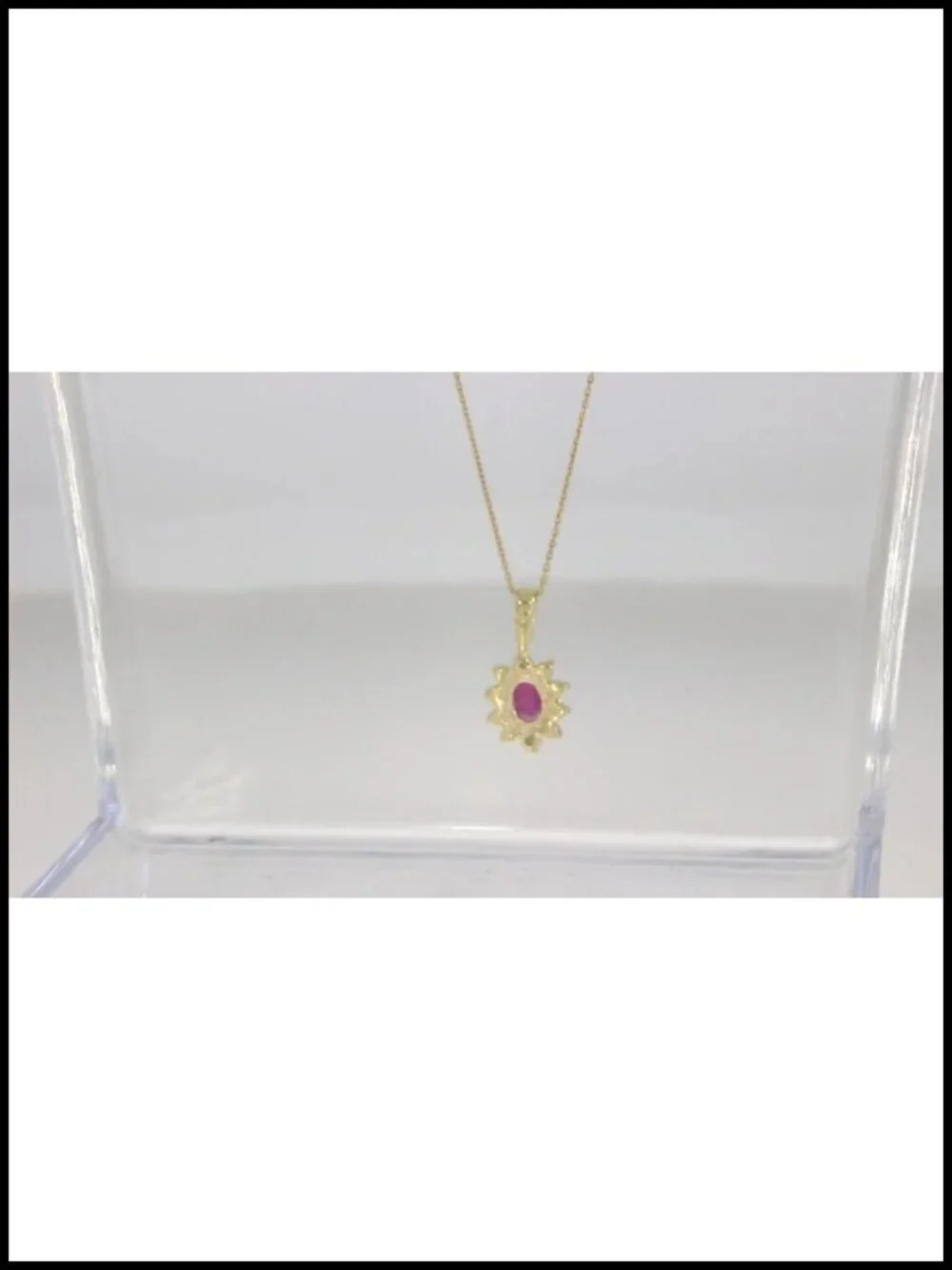 10k Yellow Gold Oval Ruby and Diamond Pendant with 18